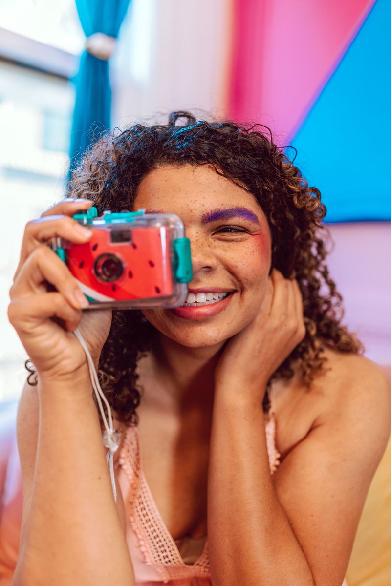 Taking Photos Without Knowing How They Turned Out
