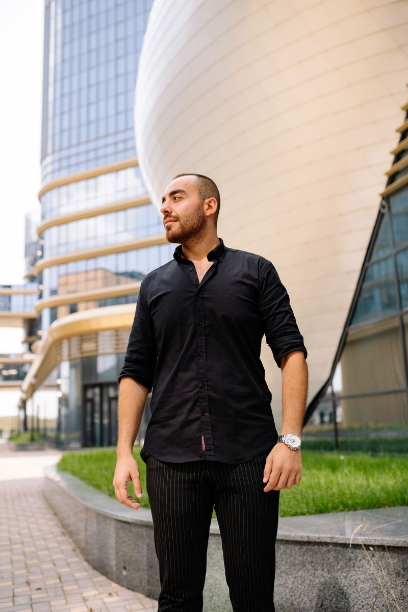 The Button-Down Shirt With Rolled-Up Sleeves