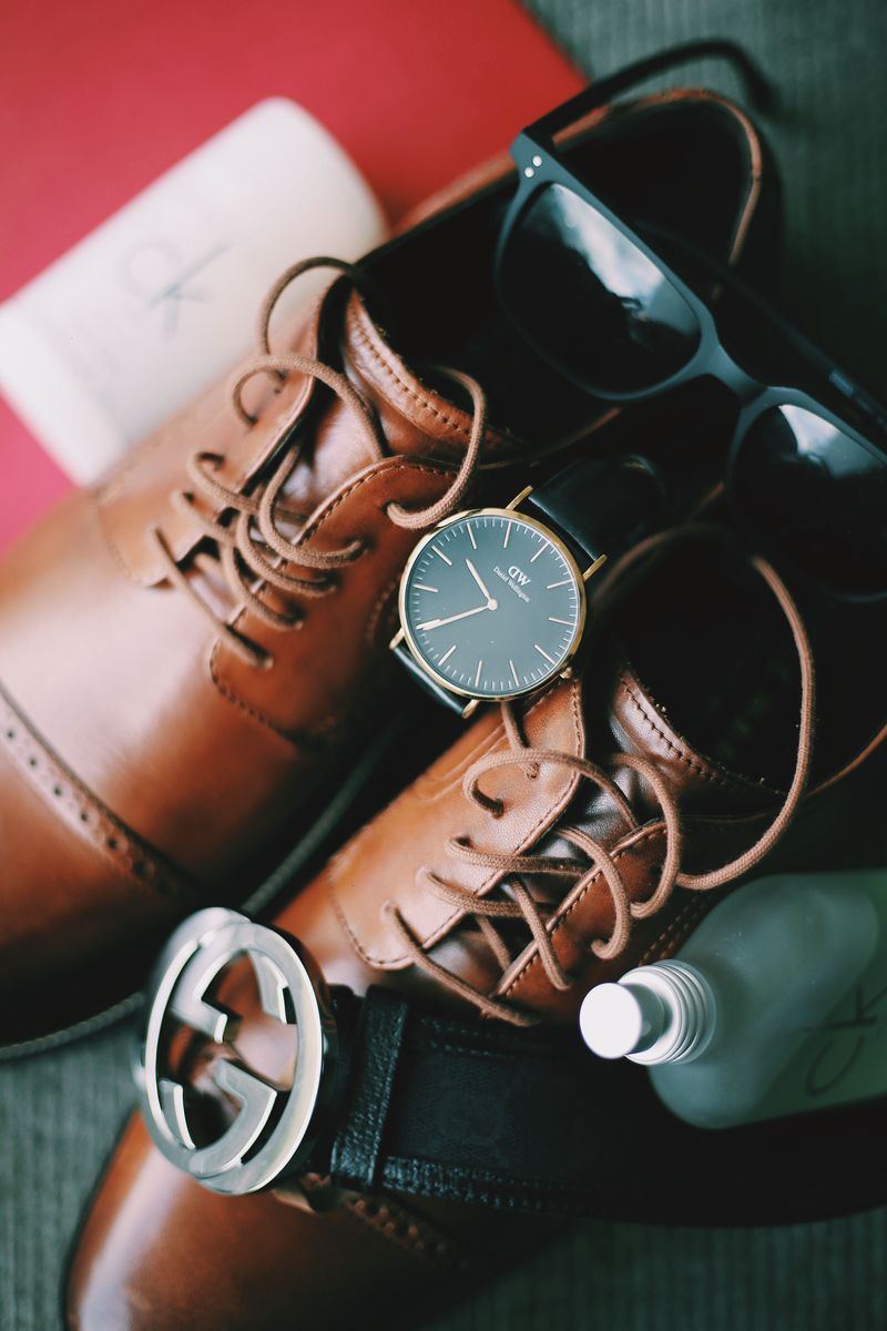 A belt and shoes that fight each other