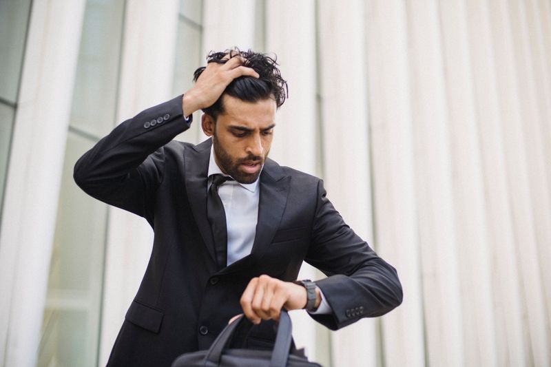 Being chronically late without acknowledging it