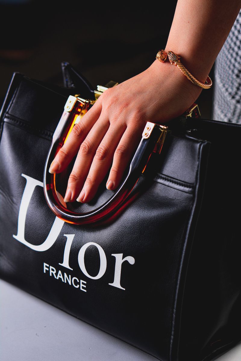 Logo-Covered Handbags