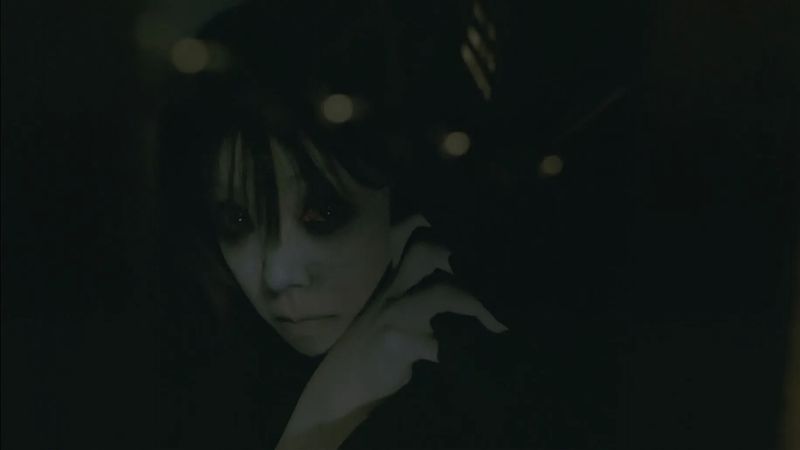 Takako Fuji as Kayako Saeki in Ju-On: The Grudge 