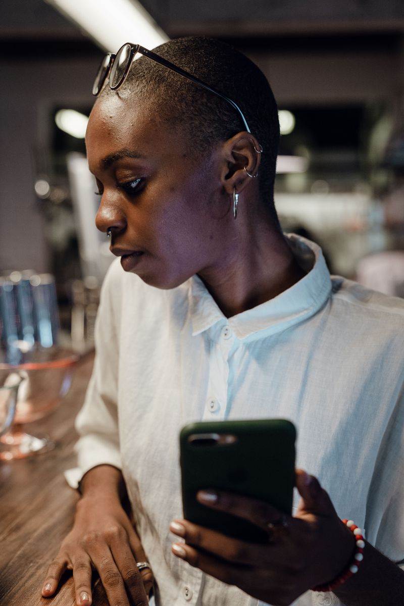 Using the Phone While Someone Is Serving or Helping You