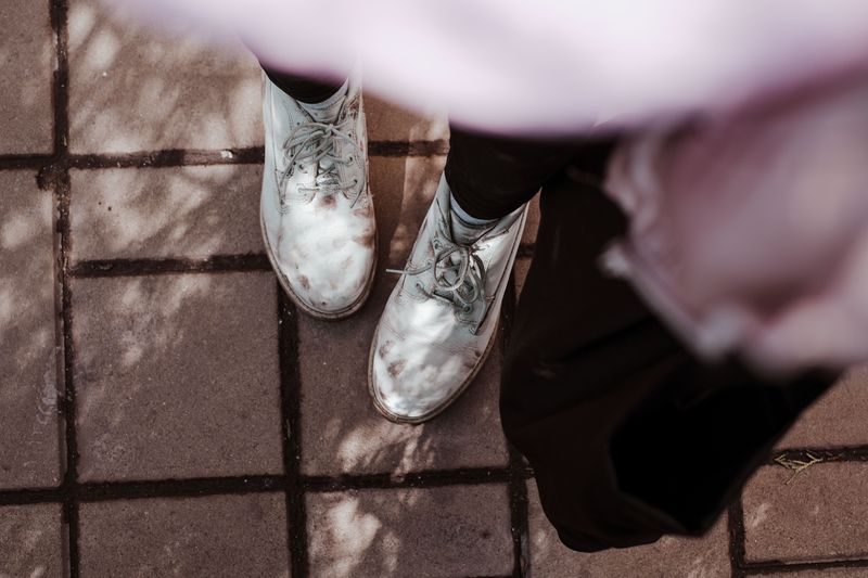Wearing scuffed or dirty shoes