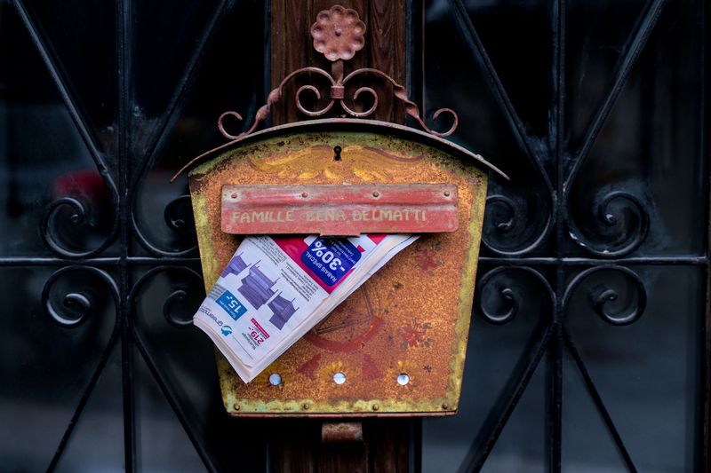 Collecting Mail and Newspapers for Vacationing Neighbors